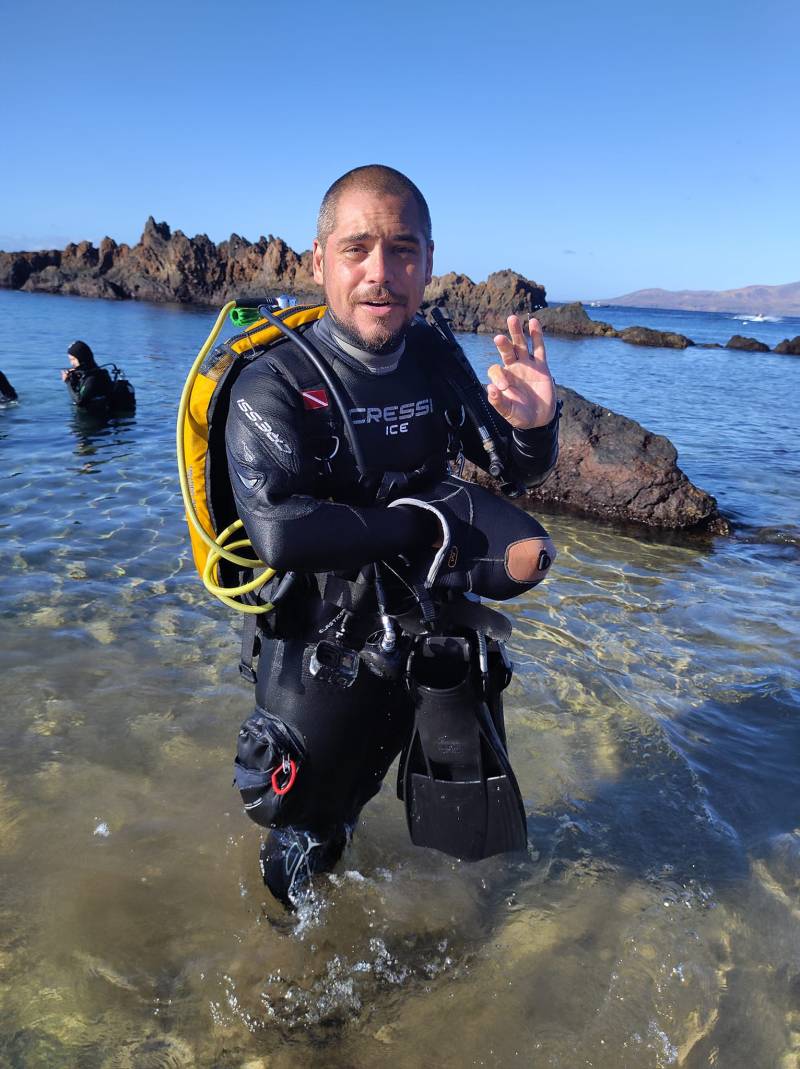 Juan web a man swimming in a body of water